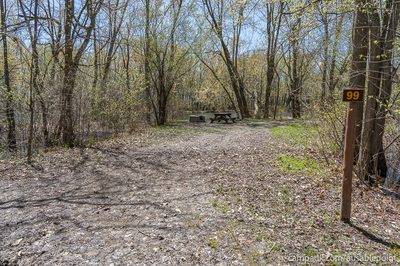 Campsite Photo of Site 99 at Ausable Point Campground, New York - Looking at Site from Road Sign Visible