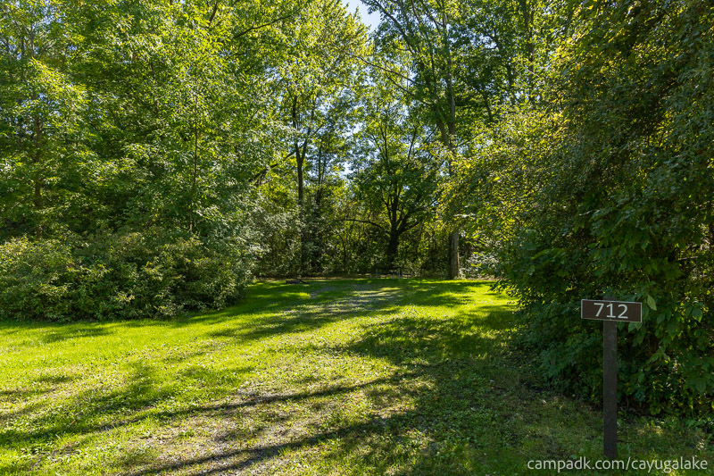 Campsite Photo of Site 712 at Cayuga Lake State Park, New York - Looking at Site from Road Sign Visible