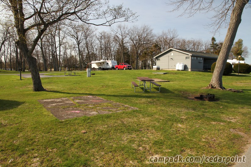 Campsite Photo of Site 10 at Cedar Point State Park, New York - Looking at Site from Road Sign Visible