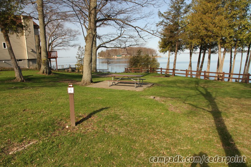 Campsite Photo of Site 4 at Cedar Point State Park, New York - Looking at Site from Road Sign Visible