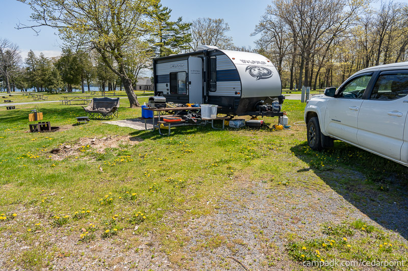 Campsite Photo of Site 10 at Cedar Point State Park, New York - Looking at Site from Road Sign Visible