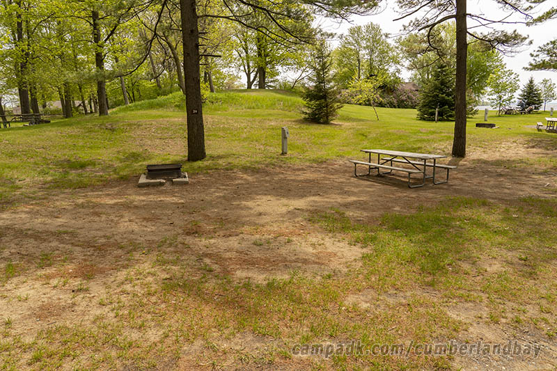 Campsite Photo of Site 39 at Cumberland Bay State Park, New York - Looking at Site from Road Sign Visible