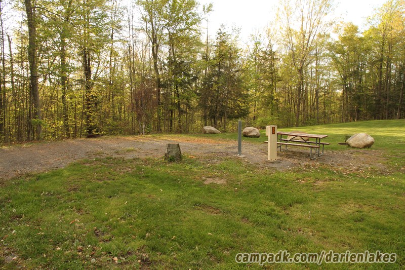 Campsite Photo of Site 30 at Darien Lakes State Park, New York - Looking at Site from Road Sign Visible