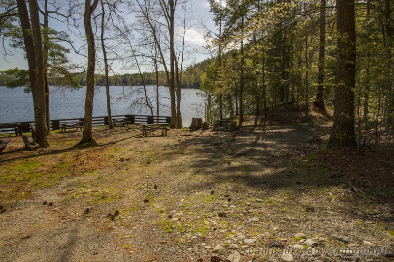 Campsite Photo of Site 7 at Eagle Point Campground, New York - Looking at Site from Road Sign Visible