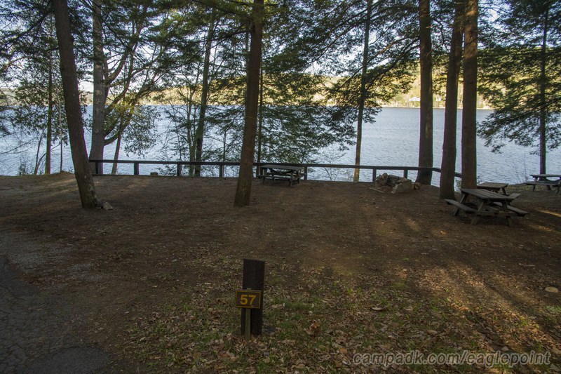 Campsite Photo of Site 57 at Eagle Point Campground, New York - Looking at Site from Road Sign Visible