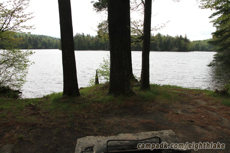 Campsite Photo of Site 112 at Eighth Lake Campground, New York - Fireplace View