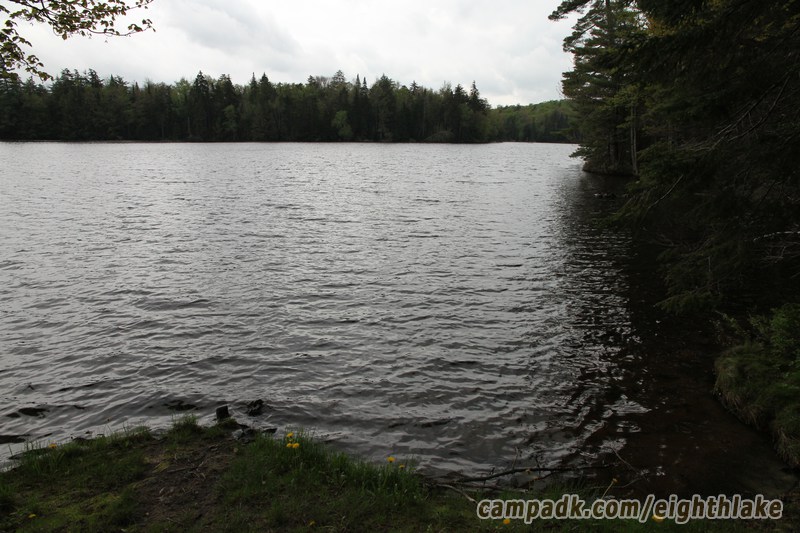 Campsite Photo of Site 112 at Eighth Lake Campground, New York - View from Shoreline