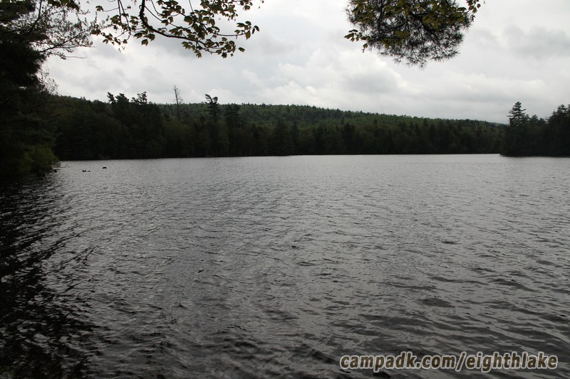 Campsite Photo of Site 112 at Eighth Lake Campground, New York - View from Shoreline