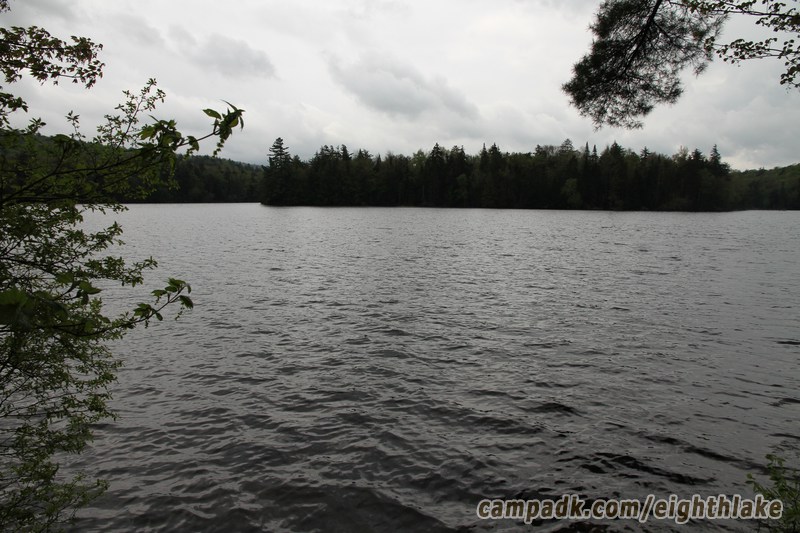 Campsite Photo of Site 112 at Eighth Lake Campground, New York - View from Shoreline