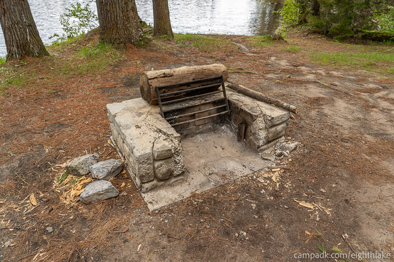Campsite Photo of Site 112 at Eighth Lake Campground, New York - Fireplace View