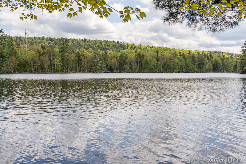 Campsite Photo of Site 112 at Eighth Lake Campground, New York - View from Shoreline
