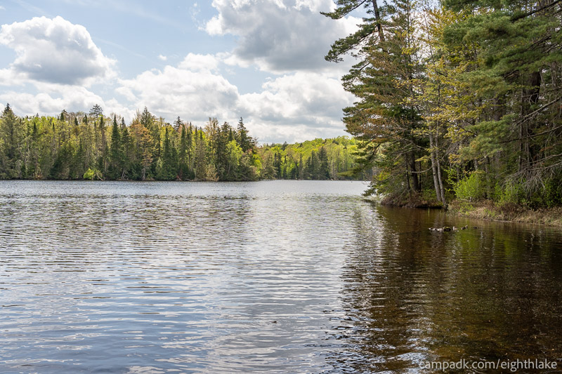 Campsite Photo of Site 112 at Eighth Lake Campground, New York - View from Shoreline
