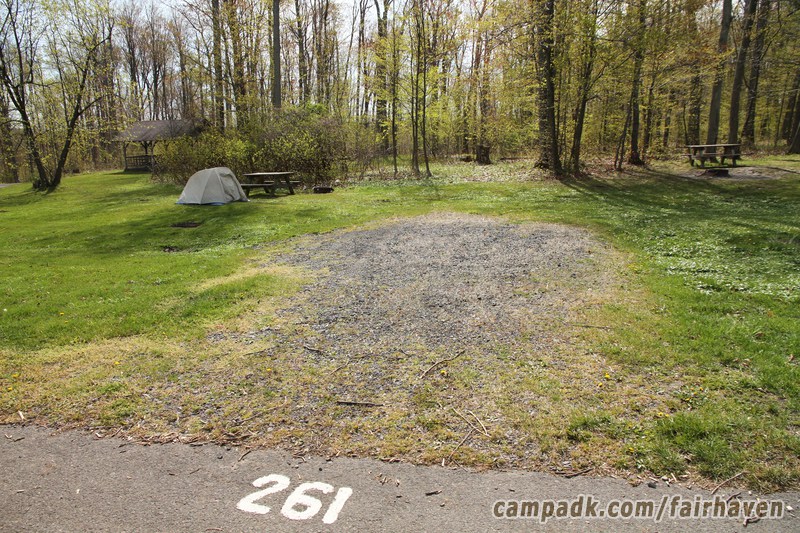 Campsite Photo of Site 261 at Fair Haven Beach State Park, New York - Looking at Site from Road Sign Visible