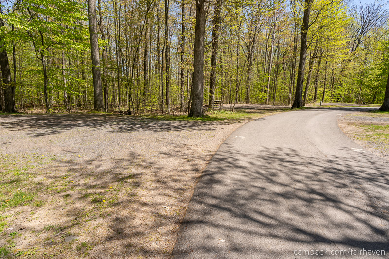 Campsite Photo of Site 75 at Fair Haven Beach State Park, New York - View Down Road from Campsite