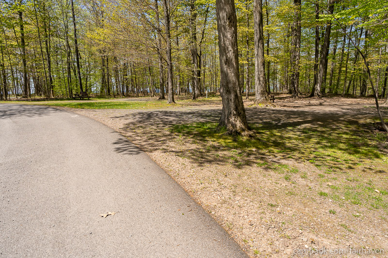 Campsite Photo of Site 75 at Fair Haven Beach State Park, New York - View Down Road from Campsite