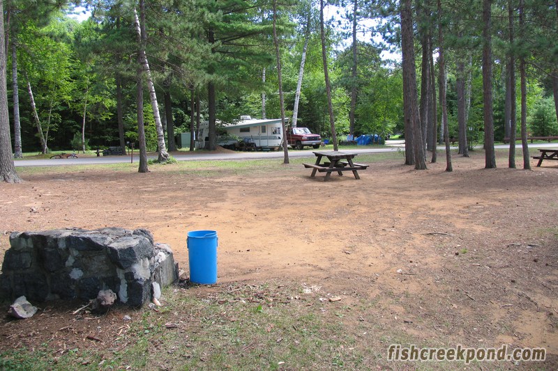 Campsite Photo of Site 1 at Fish Creek Pond Campground, New York - Looking Back Towards Road