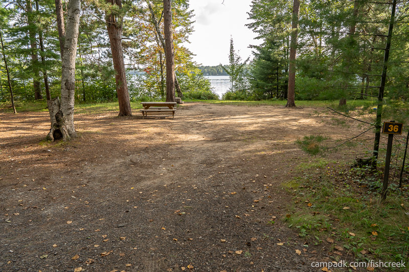 Campsite Photo of Site 46 at Fish Creek Pond Campground, New York - Looking at Site from Road Sign Visible