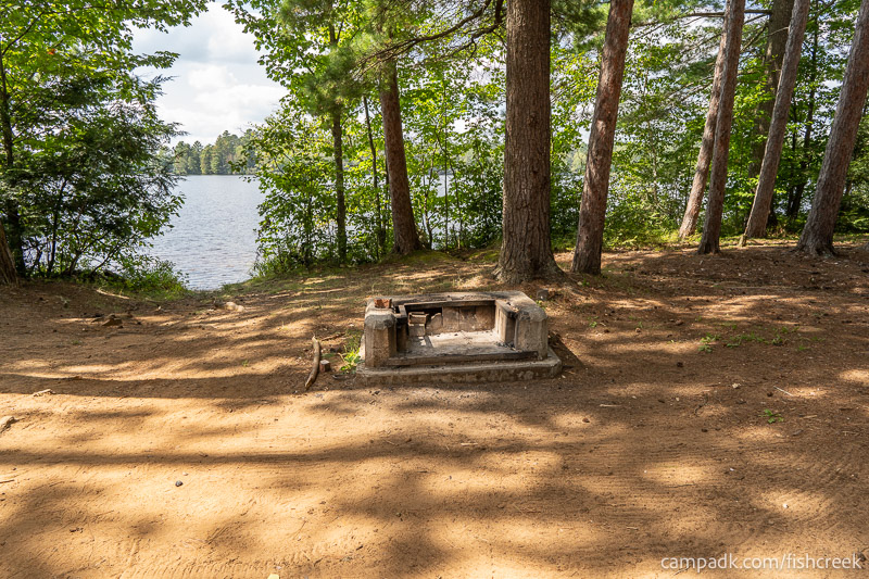 Campsite Photo of Site 1 at Fish Creek Pond Campground, New York - Fireplace View