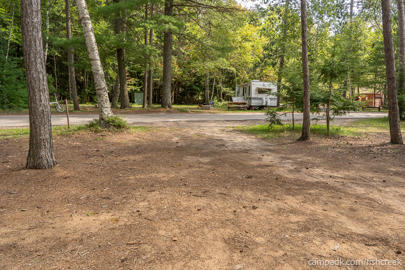 Campsite Photo of Site 1 at Fish Creek Pond Campground, New York - Looking Back Towards Road