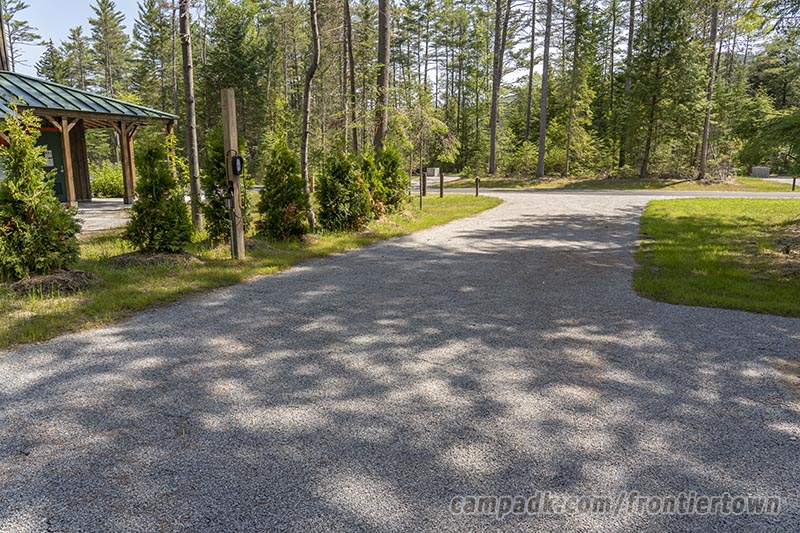 Campsite Photo of Site T65 at Frontier Town Campground, New York - Looking Back Towards Road