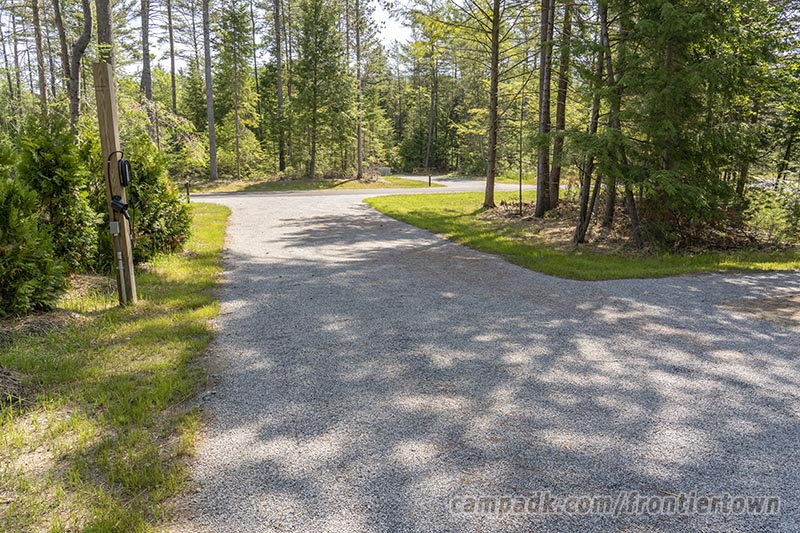 Campsite Photo of Site T65 at Frontier Town Campground, New York - Looking Back Towards Road