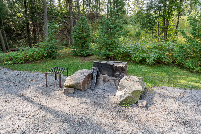 Campsite Photo of Site R44 at Frontier Town Campground, New York - Fireplace View