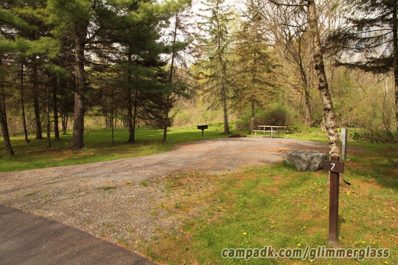 Campsite Photo of Site 7 at Glimmerglass State Park, New York - Looking at Site from Road Sign Visible