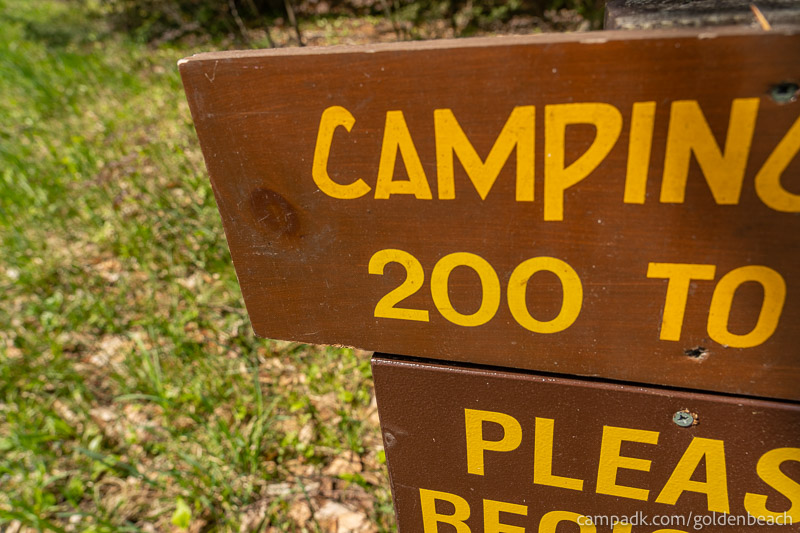 Campsite Photo of Site 200 at Golden Beach Campground, New York - Looking at Site from Road Sign Visible