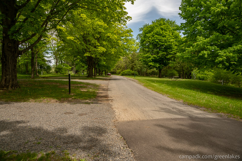 Campsite Photo of Site 116 at Green Lakes State Park, New York - View Down Road from Campsite