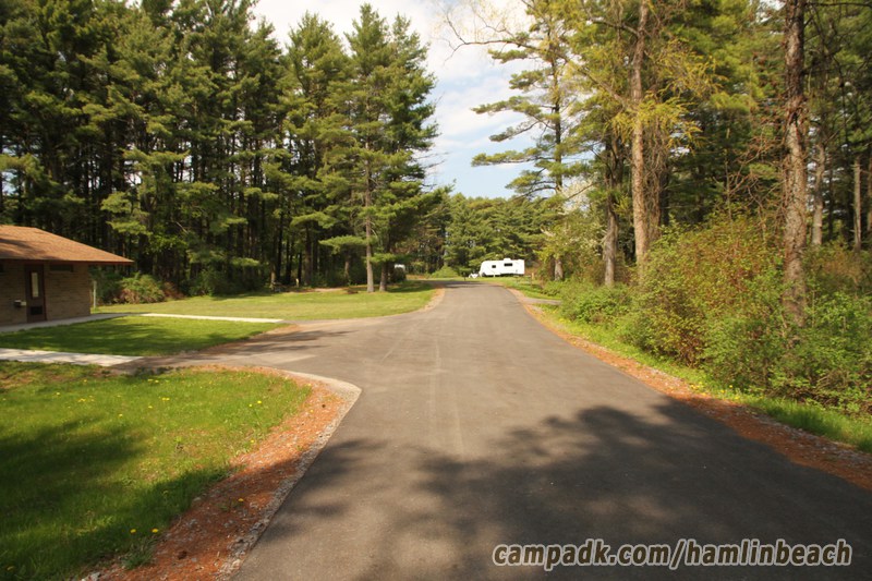 Campsite Photo of Site 216 at Hamlin Beach State Park, New York - View Down Road from Campsite