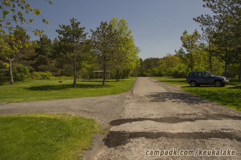Campsite Photo of Site 134 at Keuka Lake State Park, New York - View Down Road from Campsite