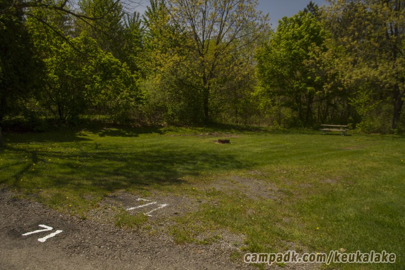 Campsite Photo of Site 13 at Keuka Lake State Park, New York - Looking at Site from Road Sign Visible