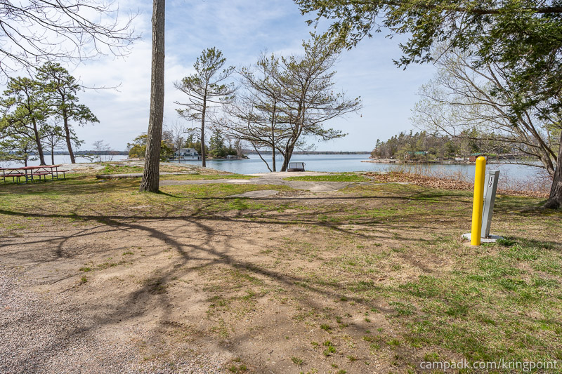 Campsite Photo of Site 19 at Kring Point State Park, New York - Looking at Site from Road Sign Visible