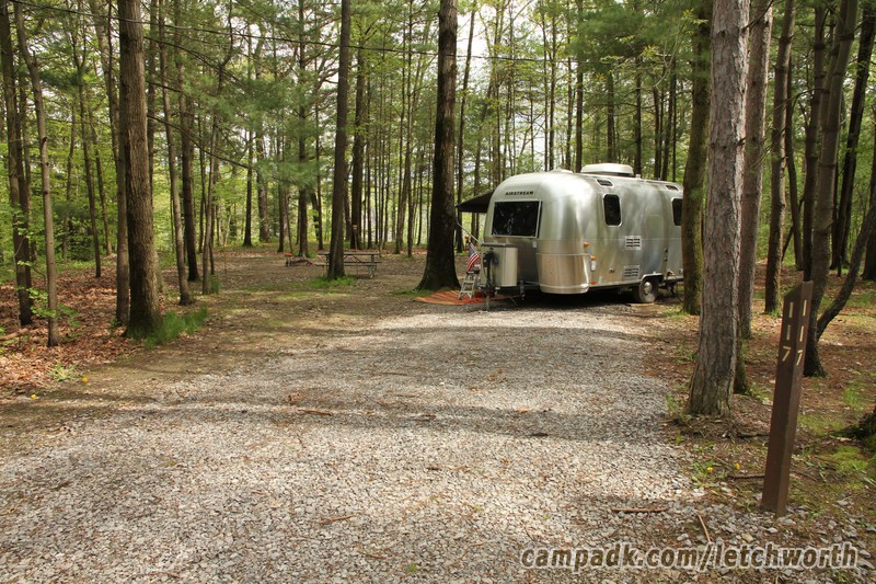 Campsite Photo of Site 117 at Letchworth State Park, New York - Looking at Site From Road Sign Visible