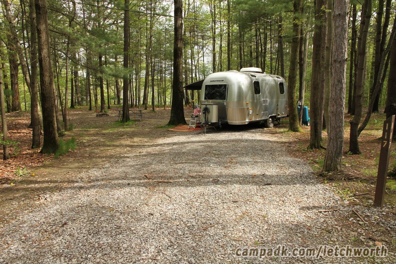 Campsite Photo of Site 117 at Letchworth State Park, New York - Looking at Site From Road Sign Visible