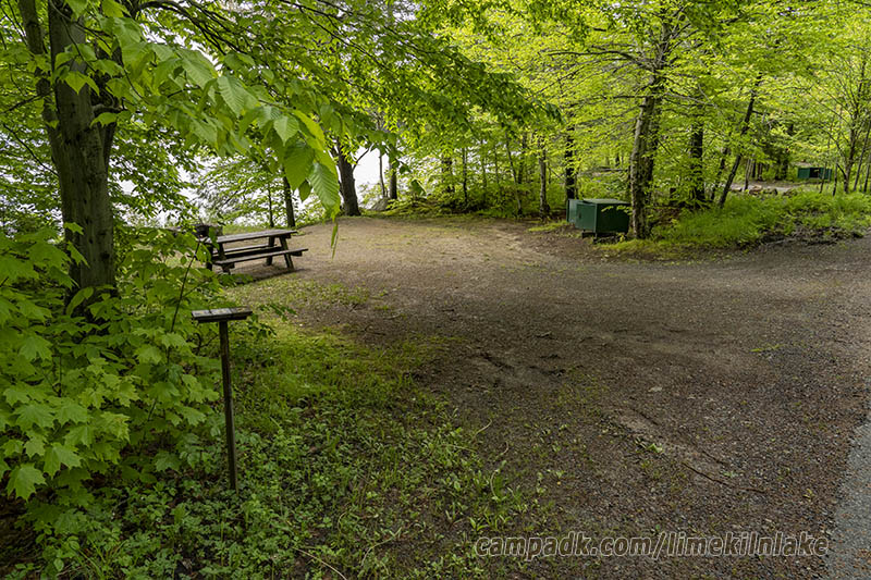 Campsite Photo of Site 162 at Limekiln Lake Campground, New York - Looking at Site from Road Sign Visible