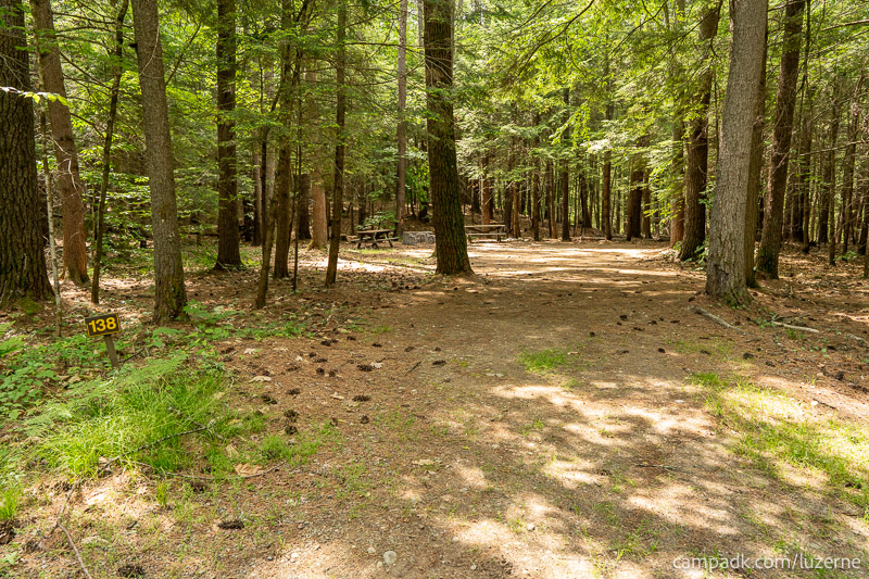 Campsite Photo of Site 138 at Luzerne Campground, New York - Looking at Site from Road Sign Visible