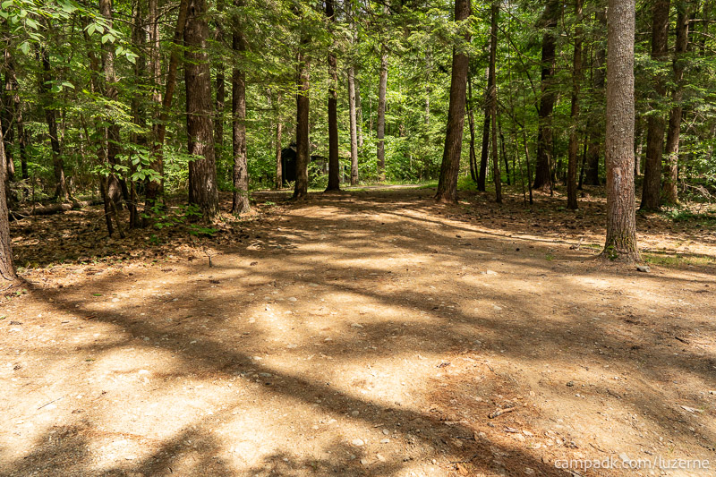 Campsite Photo of Site 138 at Luzerne Campground, New York - Looking Back Towards Road
