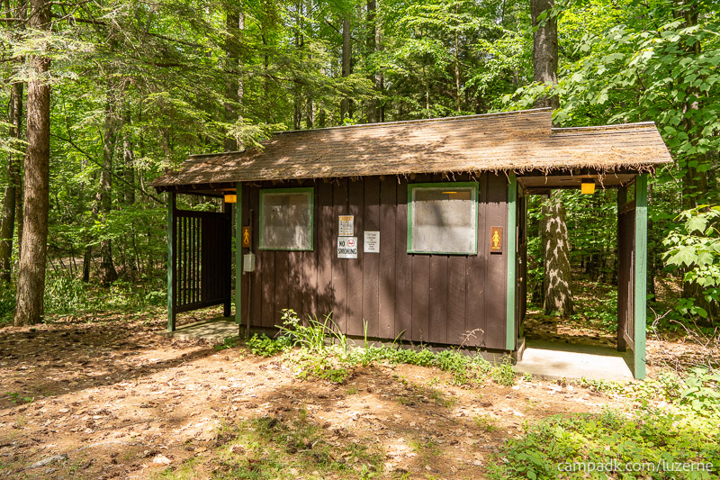 Campsite Photo of Site 138 at Luzerne Campground, New York - Washroom Across the Road