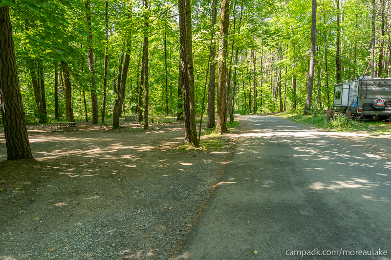 Campsite Photo of Site 28 at Moreau Lake State Park, New York - View Down Road from Campsite