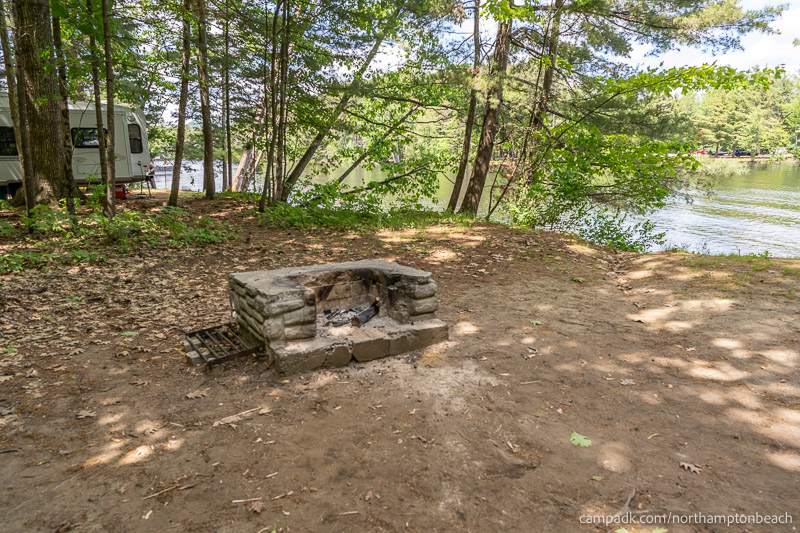 Campsite Photo of Site 74 at Northampton Beach Campground, New York - Fireplace View