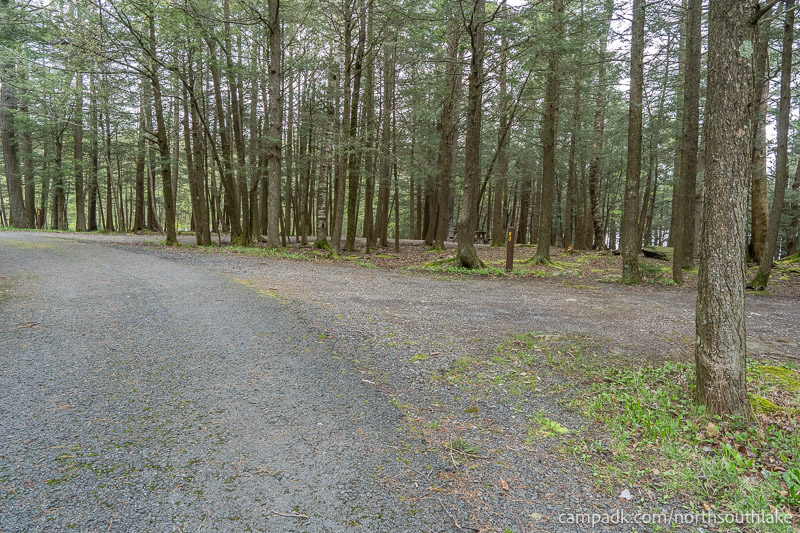Campsite Photo of Site 63 at North South Lake Campground, New York - View Down Road from Campsite