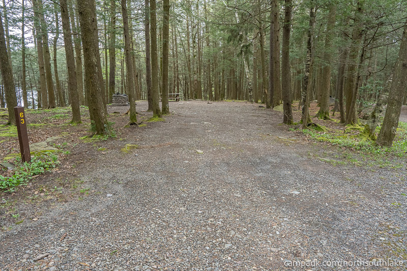 Campsite Photo of Site 63 at North South Lake Campground, New York - Looking at Site from Road Sign Visible