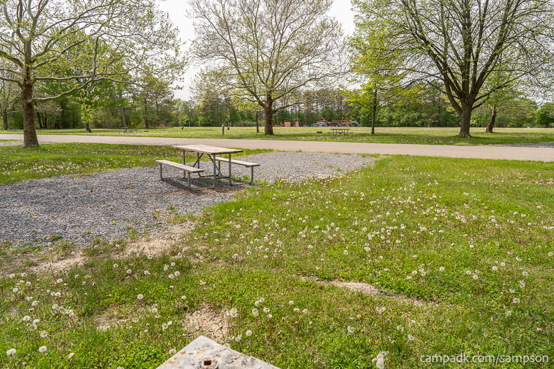Campsite Photo of Site 85 at Sampson State Park, New York - Looking Back Towards Road