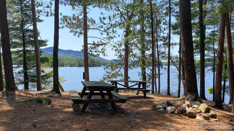 Campsite Photo of Site 65 at Saranac Lake Islands Campground, New York - Looking Towards Water From Back of Site