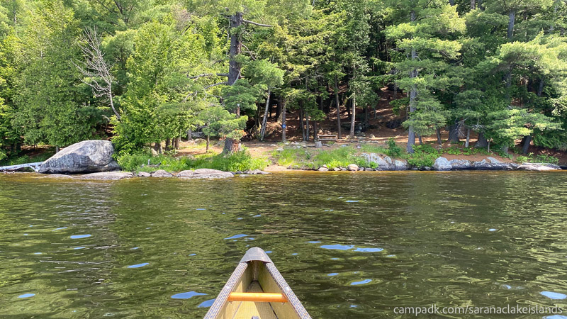 Campsite Photo of Site 5 at Saranac Lake Islands Campground, New York - View From Water on Approach