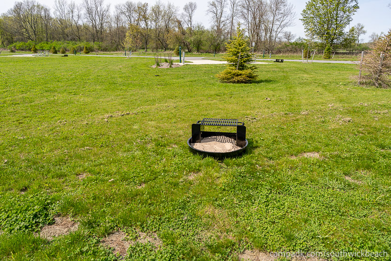 Campsite Photo of Site 121 at Southwick Beach State Park, New York - Fireplace View