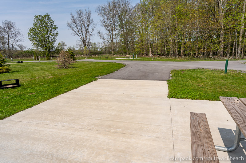 Campsite Photo of Site 121 at Southwick Beach State Park, New York - Looking Back Towards Road