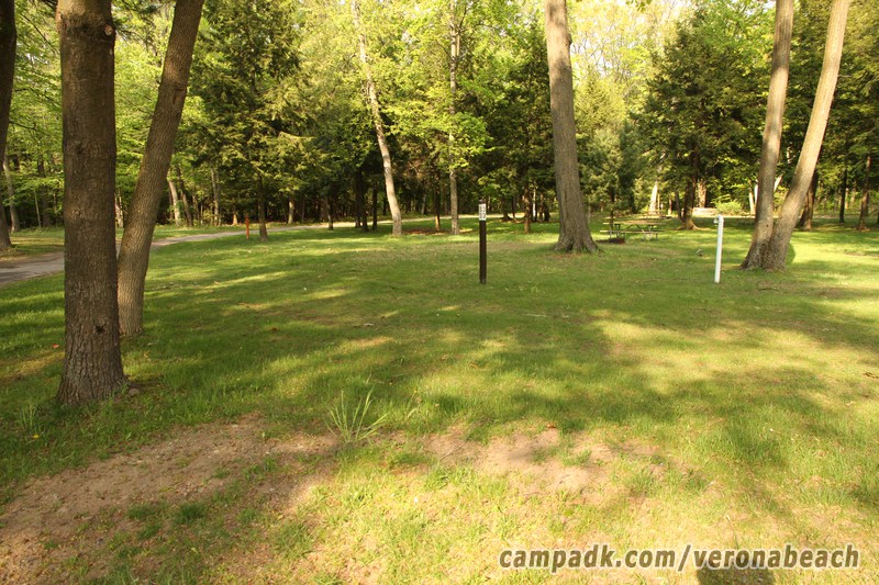 Campsite Photo of Site 32 at Verona Beach State Park, New York - Looking at Site from Road Sign Visible