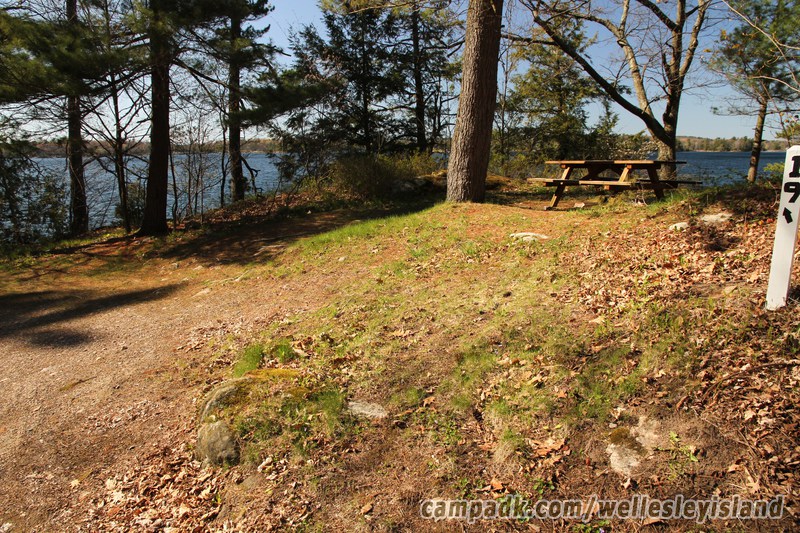 Campsite Photo of Site 19 at Wellesley Island State Park, New York - Looking at Site from Road Sign Visible